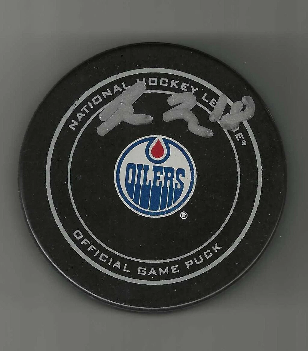 ZACH HYMAN SIGNED EDMONTON OILERS OFFICIAL GAME PUCK COLLECTIBLE MEMORABILIA