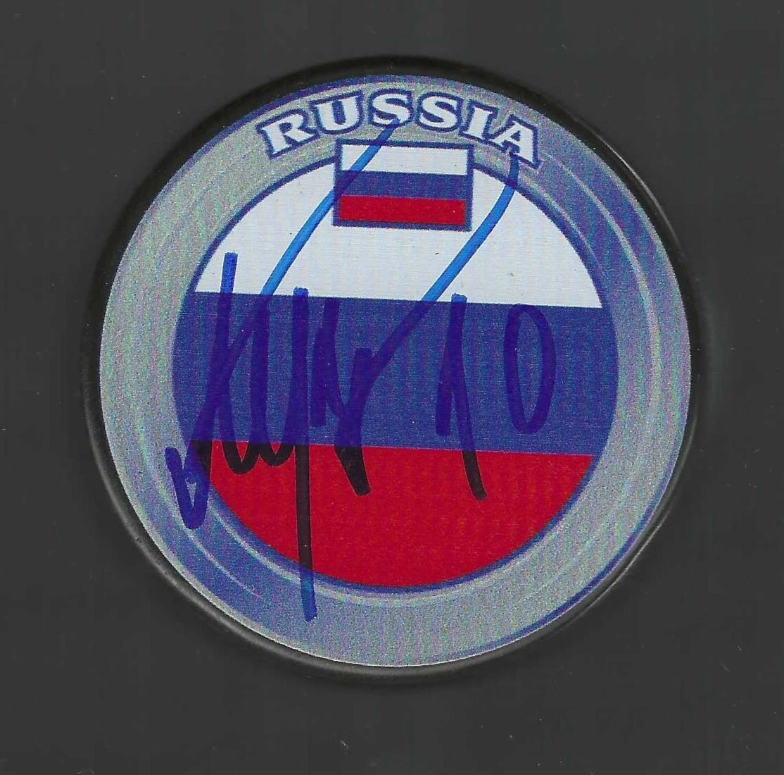 Pavel Mintyukov Signed Russia Flag Puck Saginaw Spirit Anaheim Ducks
