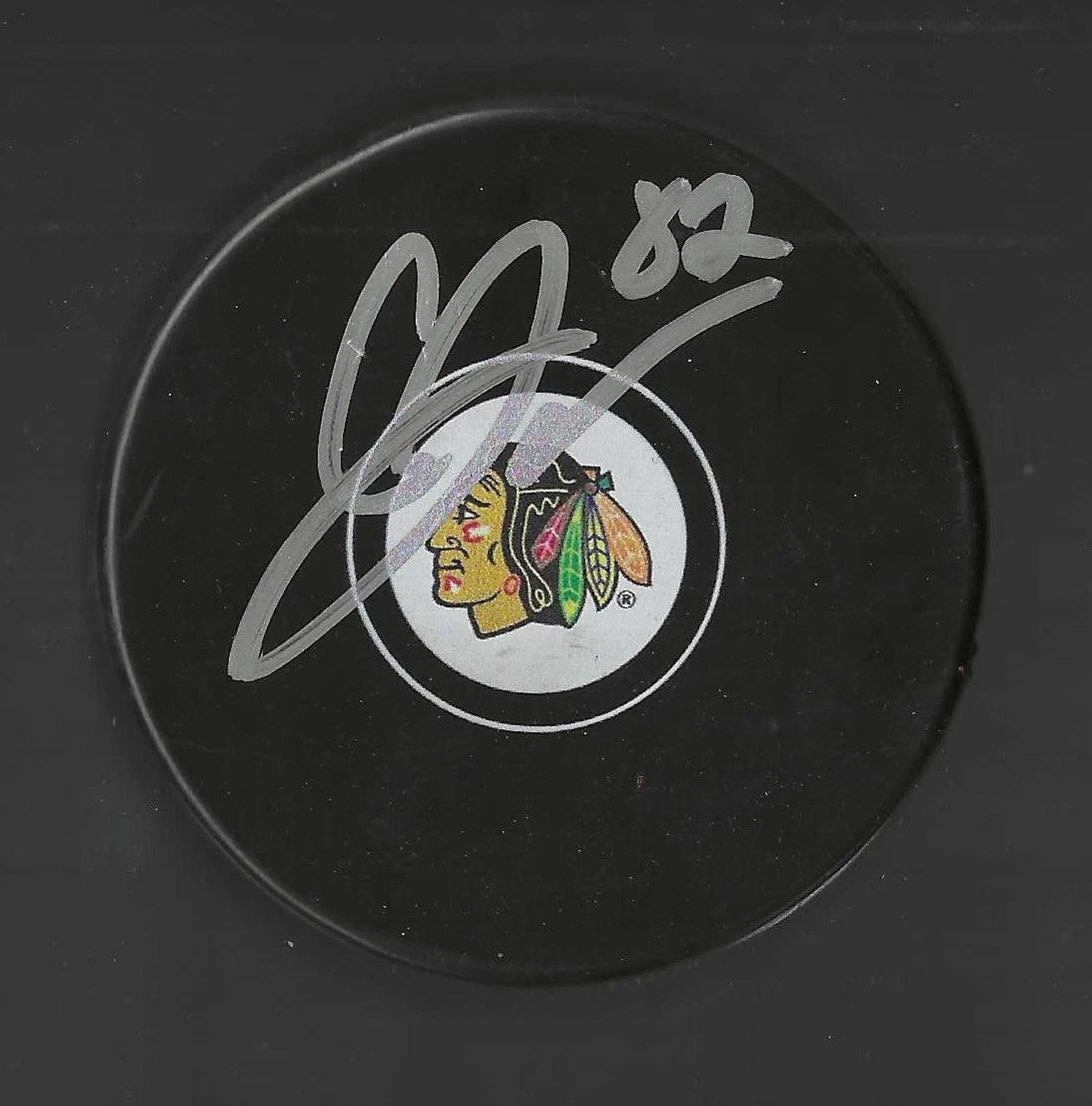 Caleb Jones Signed Chicago Blackhawks Puck
