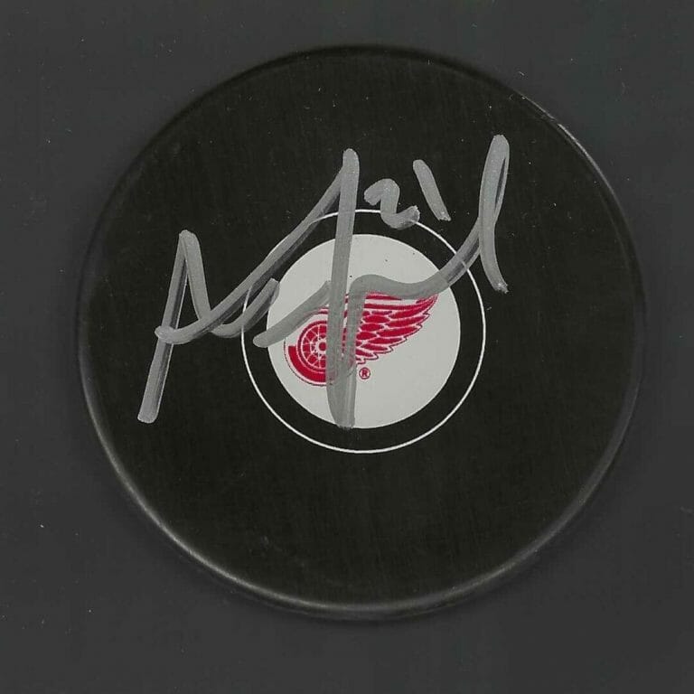 AUSTIN CZARNIK SIGNED DETROIT RED WINGS PUCK
 COLLECTIBLE MEMORABILIA