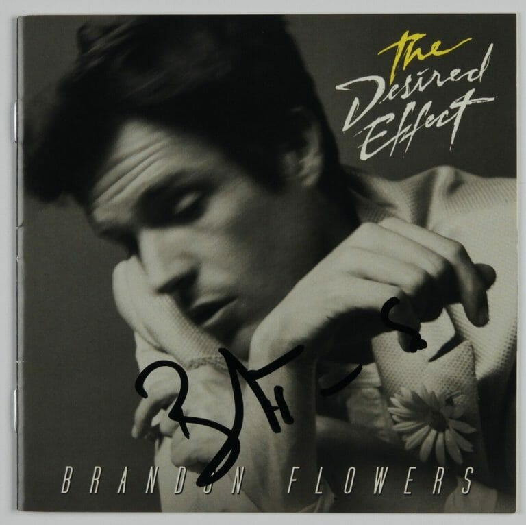 BRANDON FLOWERS JSA SIGNED AUTOGRAPH CD BOOKLET THE DESIRED EFFECT THE KILLERS
 COLLECTIBLE MEMORABILIA