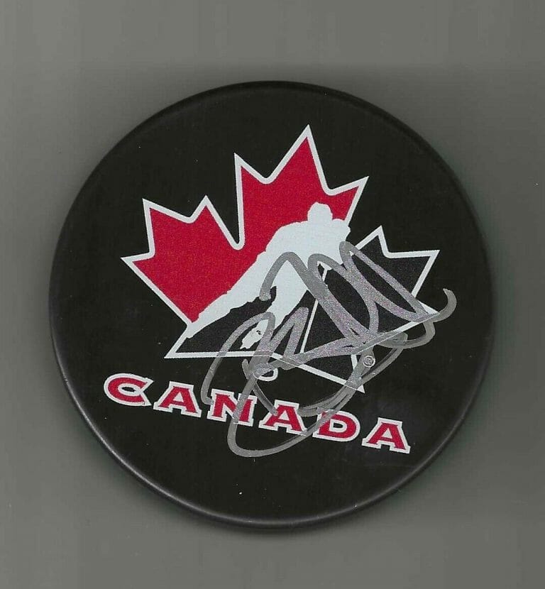 BRENT SEABROOK SIGNED CANADA HOCKEY PUCK CHICAGO BLACKHAWKS
 COLLECTIBLE MEMORABILIA