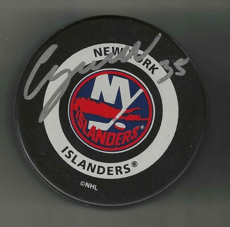 CHRIS OSGOOD SIGNED NEW YORK ISLANDERS OFFICIAL GAME PUCK
 COLLECTIBLE MEMORABILIA