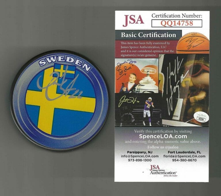 DANIEL SEDIN SIGNED SWEDEN FLAG PUCK JSA COA VANCOUVER CANUCKS
 COLLECTIBLE MEMORABILIA