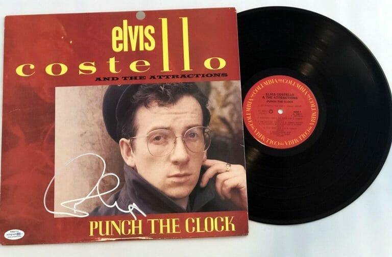 ELVIS COSTELLO PUNCH THE CLOCK AUTOGRAPHED VINYL ALBUM LP ACOA
 COLLECTIBLE MEMORABILIA