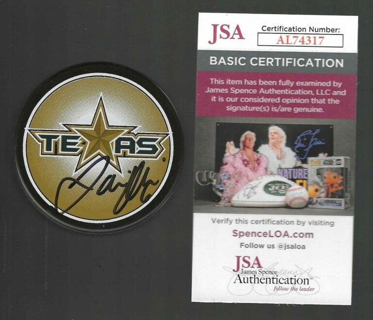 JAMIE OLEKSIAK SIGNED TEXAS STARS SOUVENIR PUCK JSA COA SEATTLE KRAKEN
 COLLECTIBLE MEMORABILIA