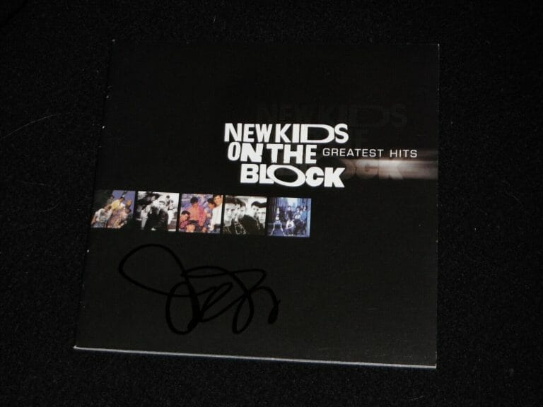 NEW KIDS ON THE BLOCK JOEY MCINTYRE SIGNED GREASTEST HITS CD COVER
 COLLECTIBLE MEMORABILIA