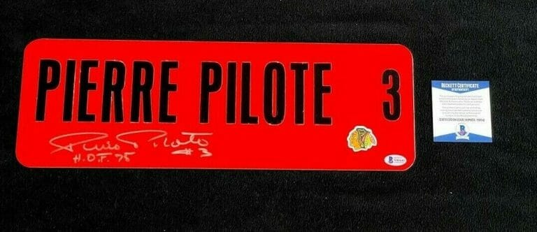 PIERRE PILOTE SIGNED 6×18 CHICAGO BLACKHAWKS CUSTOM STREET SIGN BECKETT COA
 COLLECTIBLE MEMORABILIA