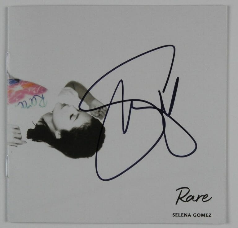 SELENA GOMEZ RARE JSA SIGNED AUTOGRAPH CD BOOKLET
 COLLECTIBLE MEMORABILIA