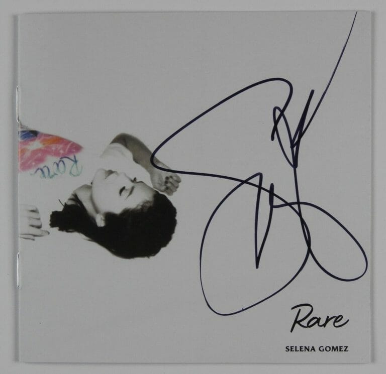 SELENA GOMEZ RARE JSA SIGNED AUTOGRAPH CD BOOKLET
 COLLECTIBLE MEMORABILIA
