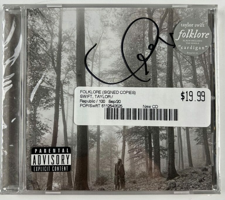 TAYLOR SWIFT SIGNED AUTOGRAPH FOLKLORE CD BOOKLET STILL SEALED HEART
 COLLECTIBLE MEMORABILIA
