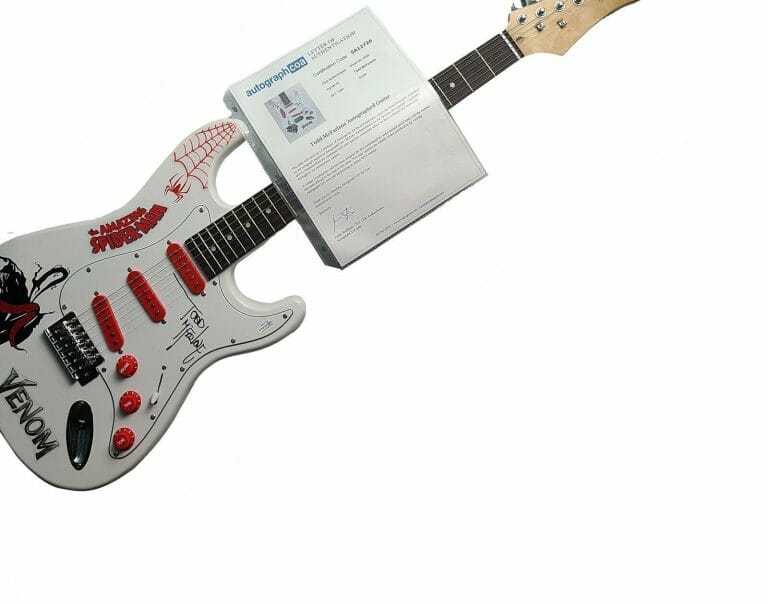 TODD MCFARLANE AUTOGRAPHED SIGNED VENOM GRAPHICS GUITAR ACOA
 COLLECTIBLE MEMORABILIA