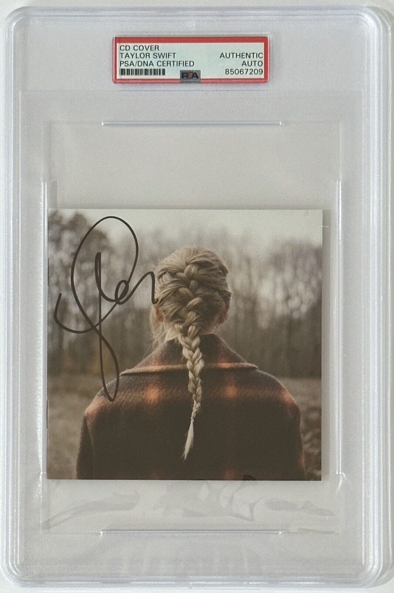 TAYLOR SWIFT SIGNED AUTOGRAPHED EVERMORE CD COVER PSA DNA CERTIFIED COA RARE!
 COLLECTIBLE MEMORABILIA
