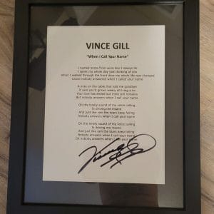 VINCE GILL SIGNED FRAMED WHEN I CALL YOUR NAME AUTOGRAPHED LYRIC SHEET
