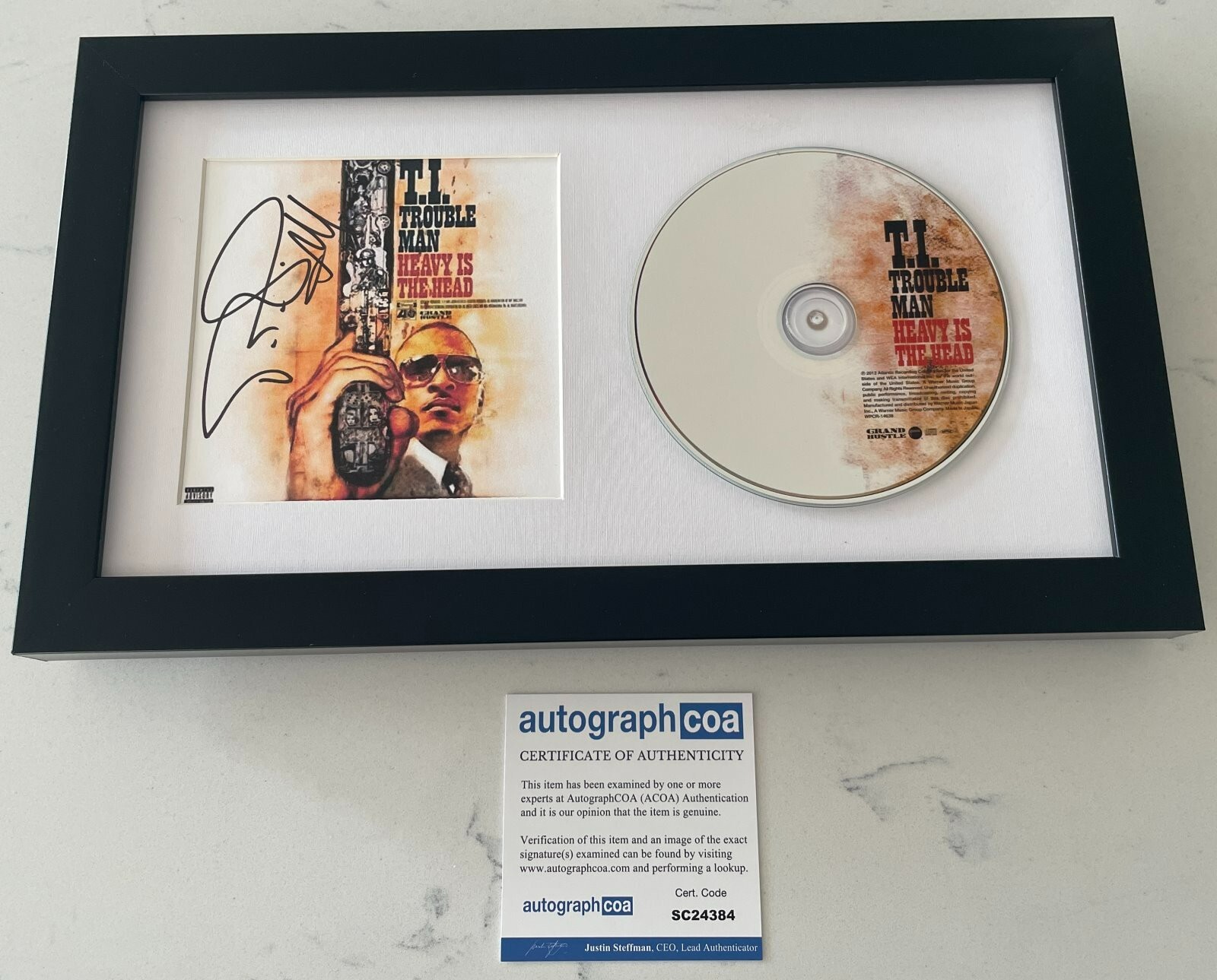 T.I. TIP SIGNED TROUBLE MAN HEAVY IS THE HEAD FRAMED CD & AUTOGRAPH COA ACOA