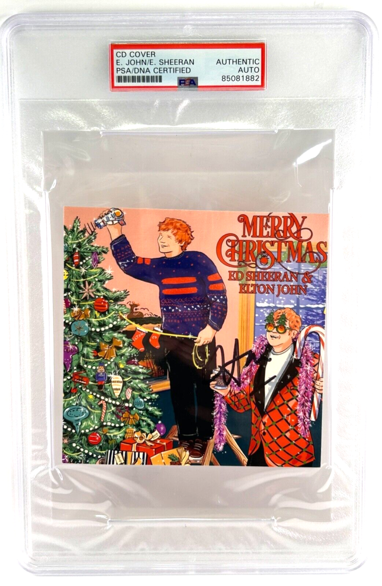 ELTON JOHN ED SHEERAN SIGNED SLABBED ENCAPSULATED “MERRY CHRISTMAS” PSA DNA 882 COLLECTIBLE MEMORABILIA