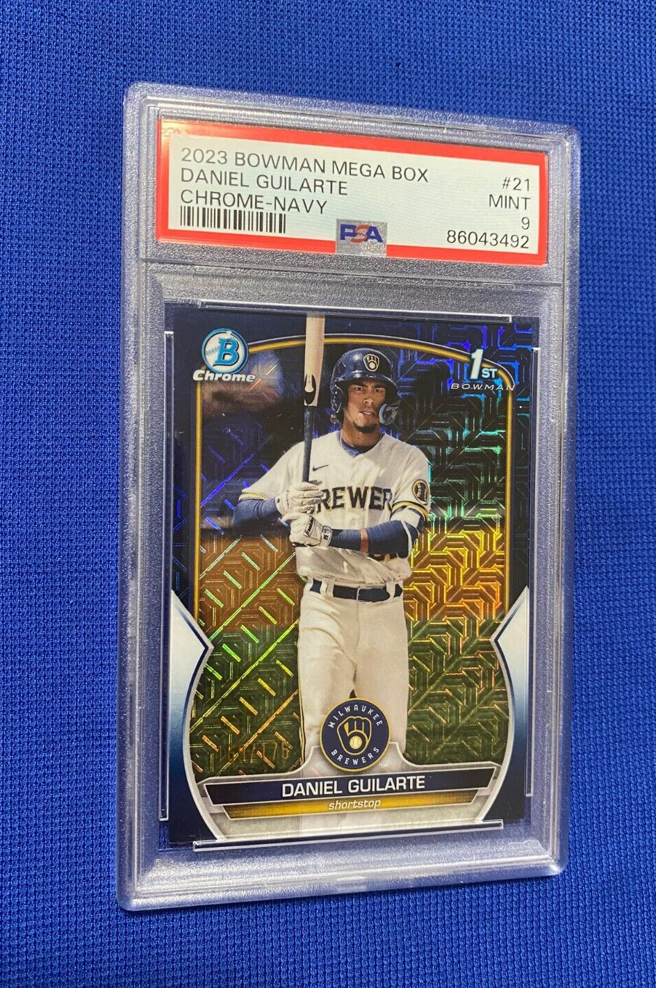 2023 BOWMAN MEGA BOX DANIEL GUILARTE BREWERS CHROME NAVY RC CARD /175 PSA 9 MINT