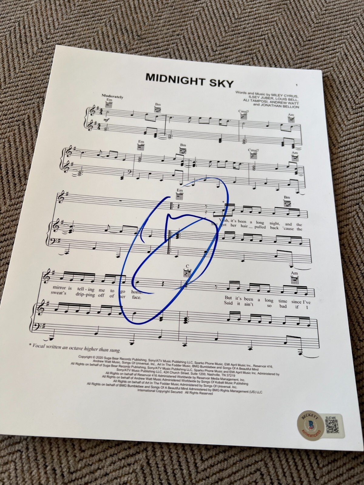 MILEY CYRUS SIGNED SHEET MUSIC MIDNIGHT SKY PARTY IN THE USA BECKETT BAS COA D