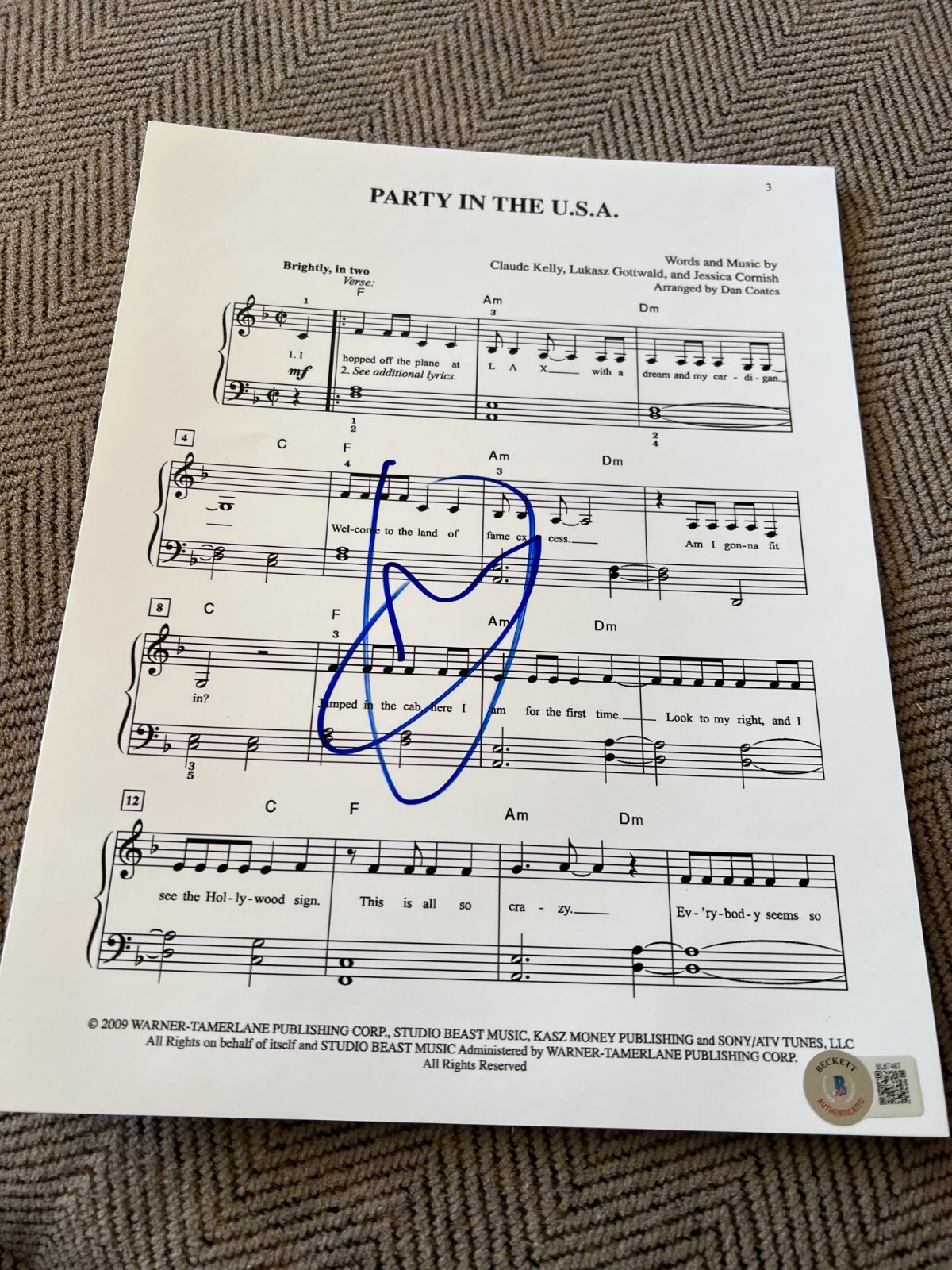 MILEY CYRUS SIGNED SHEET MUSIC MIDNIGHT SKY PARTY IN THE USA BECKETT BAS COA F