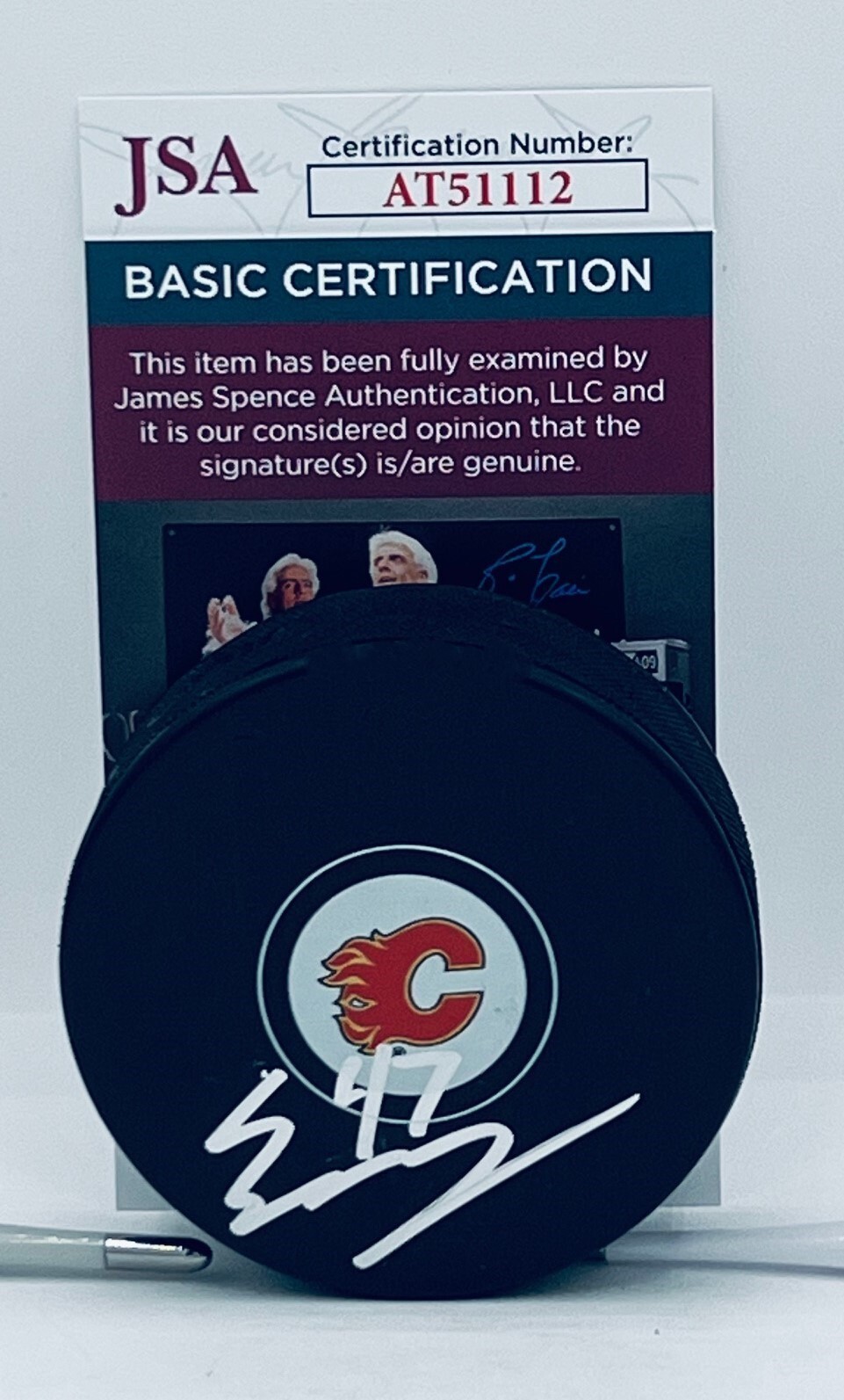 Connor Zary signed Calgary Flames Logo Puck autographed JSA
