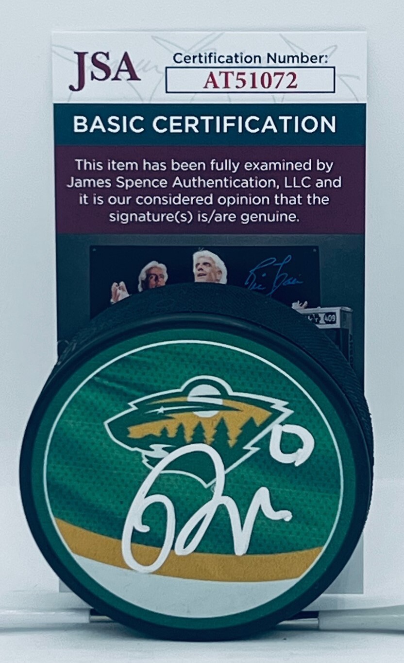 Marco Rossi signed Minnesota Wild Reverse Retro Puck autographed JSA