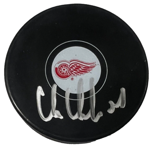 CHRIS CHELIOS signed (DETROIT RED WINGS) Hockey puck BECKETT BAS BM02744