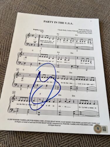 MILEY CYRUS SIGNED SHEET MUSIC MIDNIGHT SKY PARTY IN THE USA BECKETT BAS COA E COLLECTIBLE MEMORABILIA