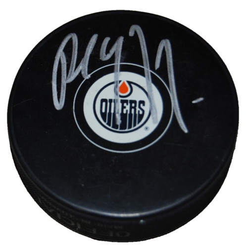 PAUL COFFEY signed (EDMONTON OILERS) hockey puck BECKETT BAS BJ54498