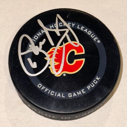 PHIL HOUSLEY SIGNED CALGARY FLAMES OFFICIAL GAME PUCK BECKETT (BAS) COLLECTIBLE MEMORABILIA