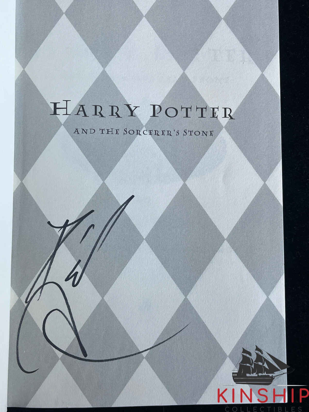 Daniel Radcliffe signed Harry Potter And The Sorcerer's Stone Book JSA COA E198
