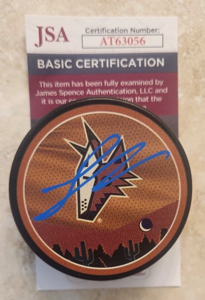 Logan Cooley Signed Reverse Retro Puck w/ JSA COA #AT63056 Arizona Coyotes