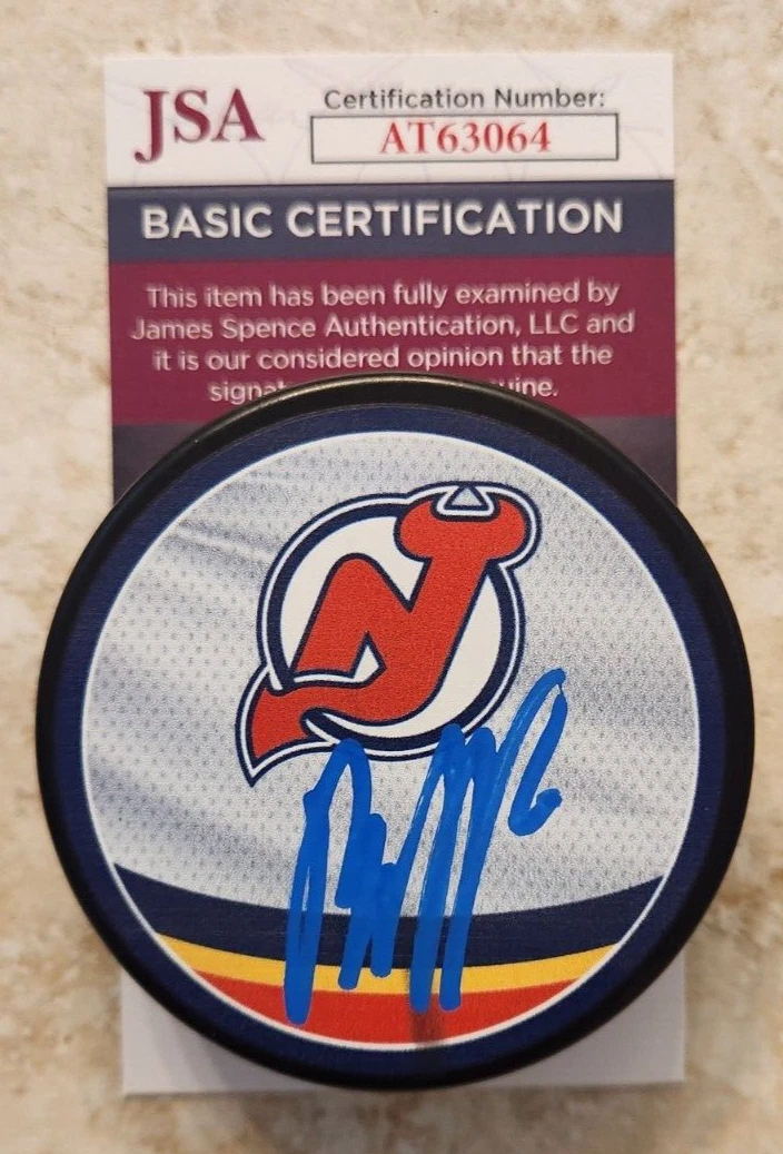 Jesper Bratt Signed Reverse Retro Puck w/ JSA COA #AT63064 New Jersey Devils