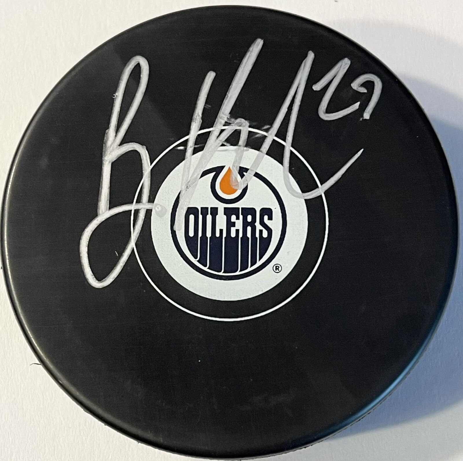 Brett Kulak Signed Autographed Edmonton Oilers Logo Hockey Puck PSA/DNA