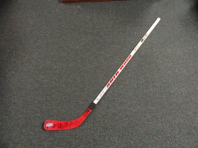2010 WINDSOR SPITFIRES TEAM SIGNED STICK TAYLOR HALL