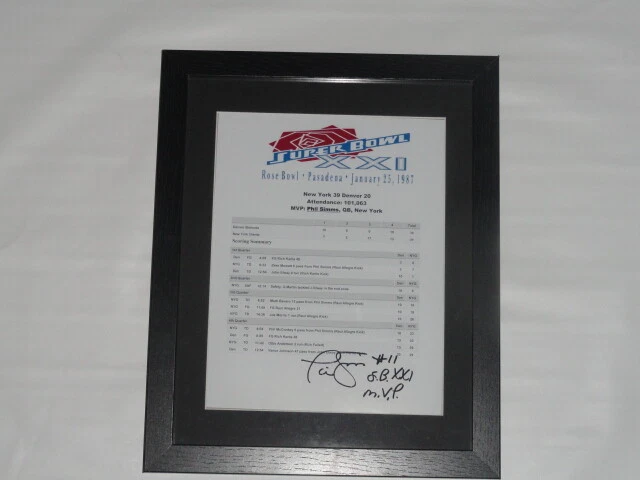 PHIL SIMMS SIGNED FRAMED AND MATTED SUPER BOWL XXI BOX SCORE MVP PROOF