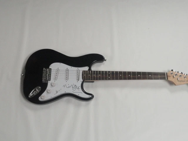 NICK LOWE SIGNED BLACK ELECTRIC GUITAR ELVIS COSTELLO LEGEND AUTOGRAPHED