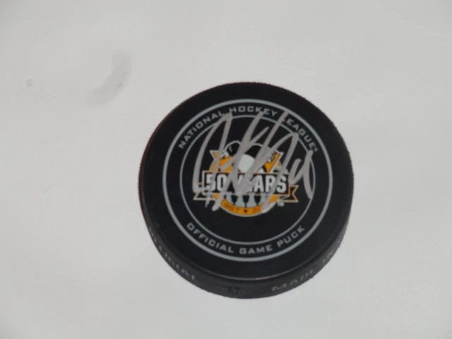 JUSTIN SCHULTZ SIGNED PITTSBURGH PENGUINS 50TH ANNIVERSARY OFFICIAL GAME PUCK