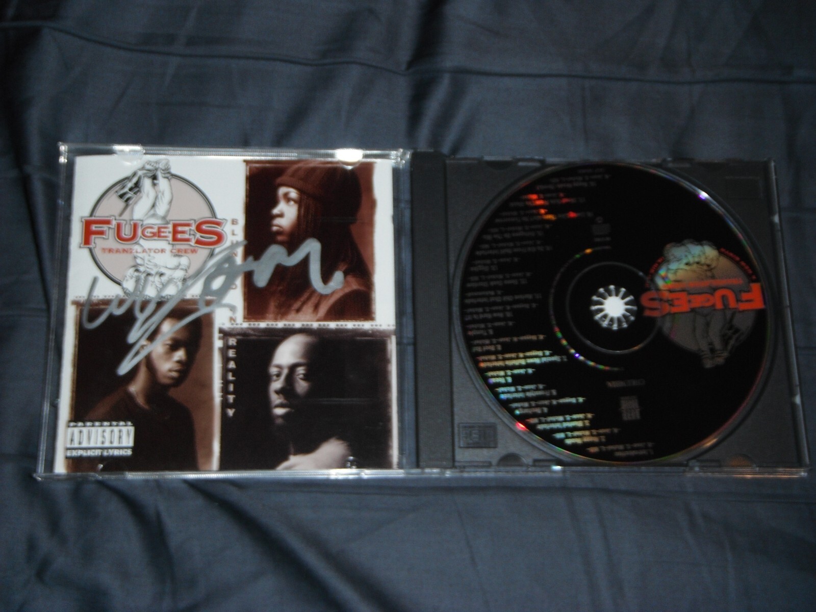 FUGEES (TRANZLATOR CREW) SIGNED BLUNTED ON REALITY LAURYN HILL & WYCLEF CD COVER