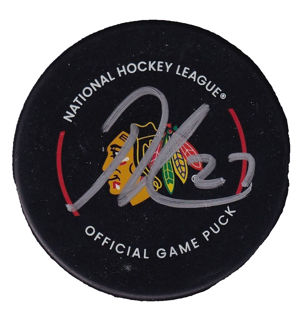 LUKAS REICHEL signed (CHICAGO BLACKHAWKS) Game hockey puck BECKETT BAS AD27401