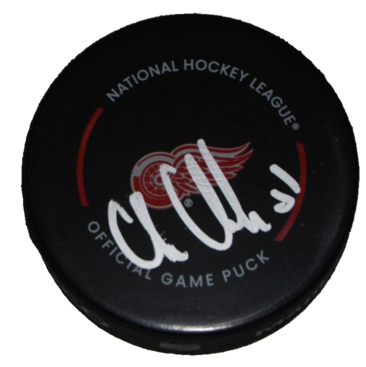 CHRIS CHELIOS signed (DETROIT RED WINGS) official game puck BECKETT BAS BM39133