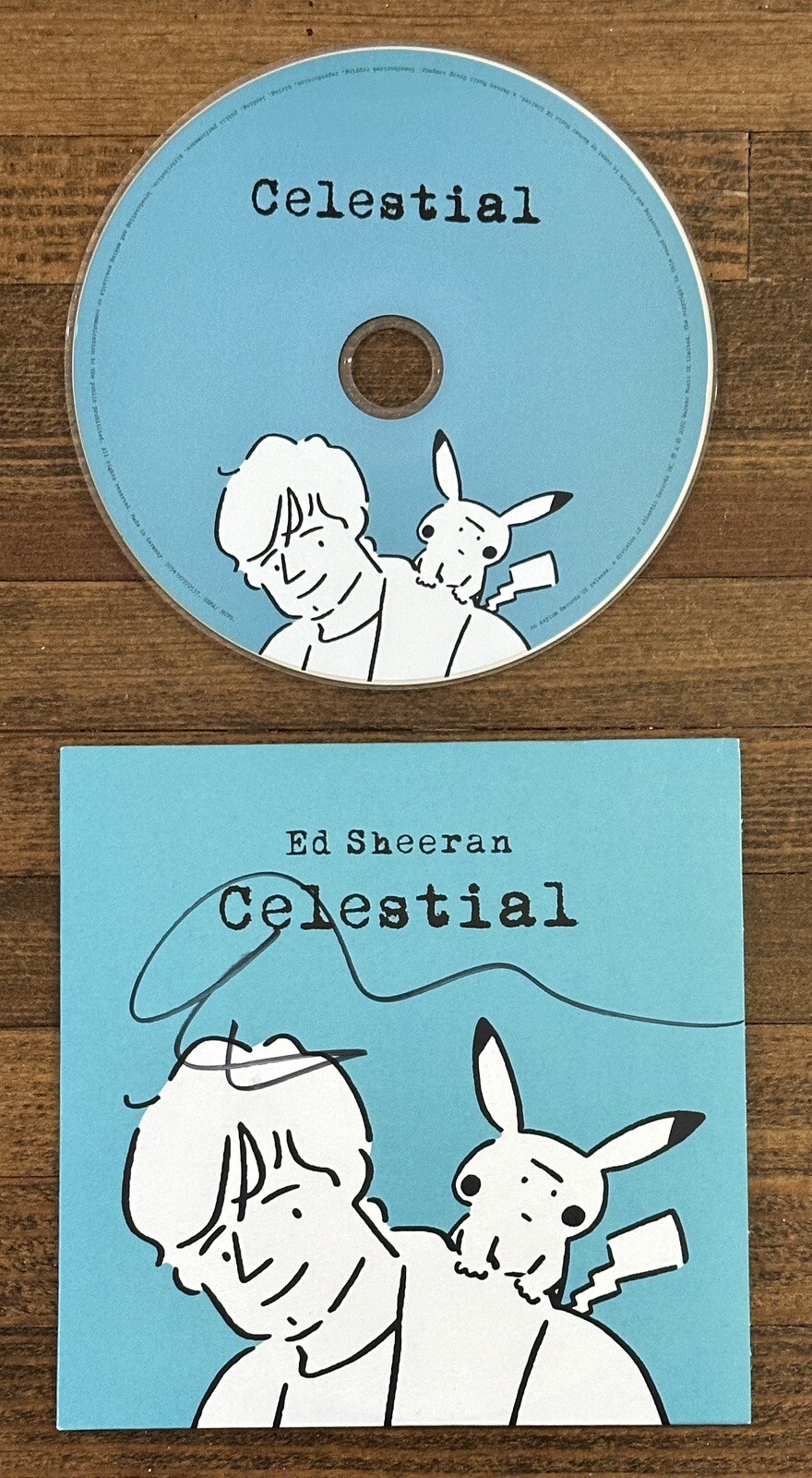 ED SHEERAN SIGNED CELESTIAL CD COVER BAS BECKETT COA AUTOGRAPH Pokemon Pikachu