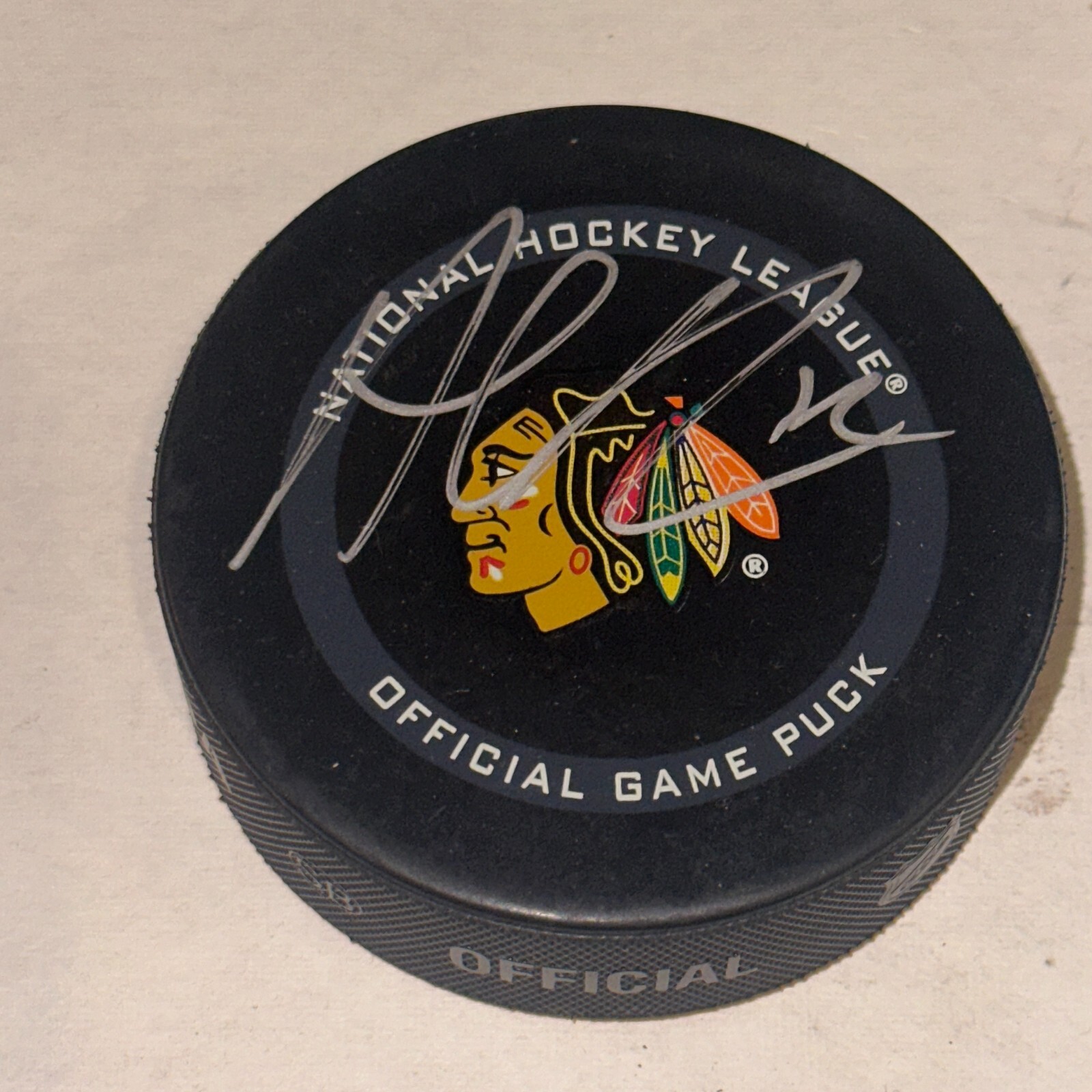 ALEX DEBRINCAT Signed Chicago BLACKHAWKS Official GAME Puck Beckett BAS