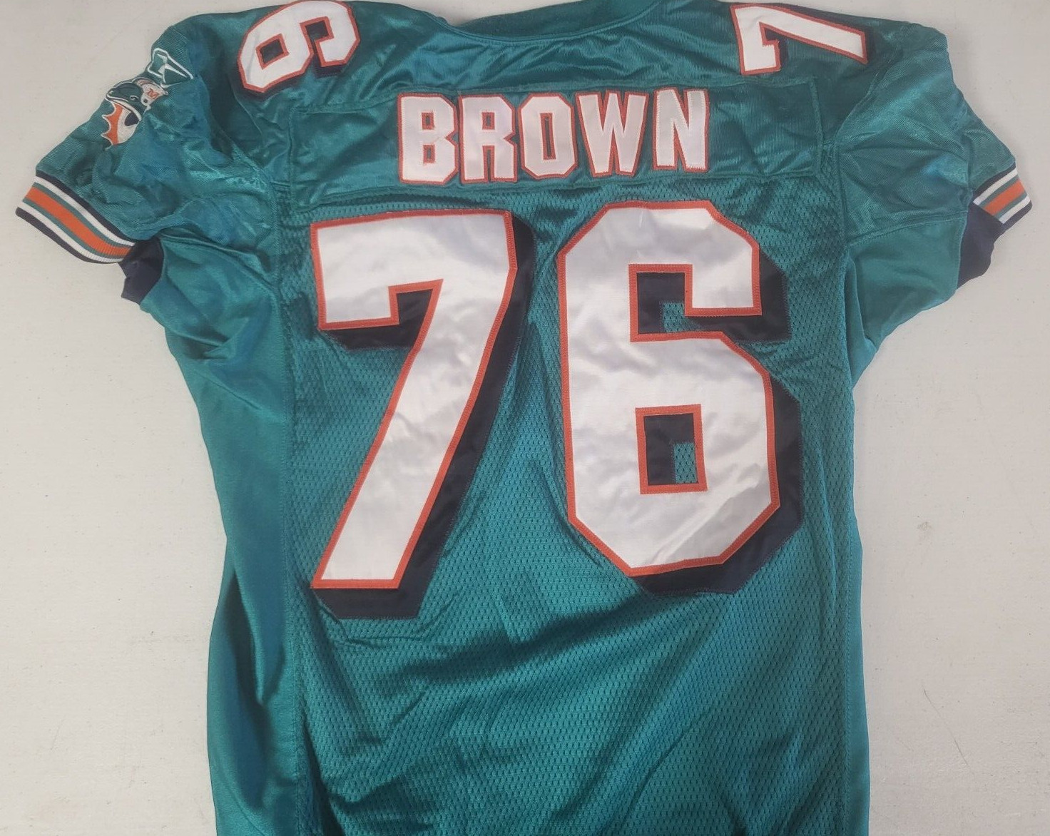 MIAMI DOLPHINS JAMES BROWN #76 GAME USED REEBOK NFL FOOTBALL JERSEY