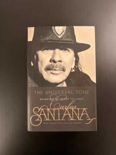 CARLOS SANTANA SIGNED BOOK PSA/DNA THE UNIVERSAL TONE: BRINGING MY STORY TO LIGH COLLECTIBLE MEMORABILIA