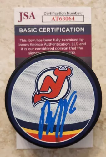 Jesper Bratt Signed Reverse Retro Puck w/ JSA COA #AT63064 New Jersey Devils