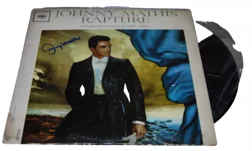 JOHNNY MATHIS SIGNED (RAPTURE) VINYL ALBUM RECORD BECKETT BAS BM027329 COLLECTIBLE MEMORABILIA