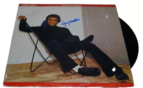 JOHNNY MATHIS SIGNED (YOU LIGHT ME UP) VINYL ALBUM RECORD BECKETT BAS BM027327 COLLECTIBLE MEMORABILIA