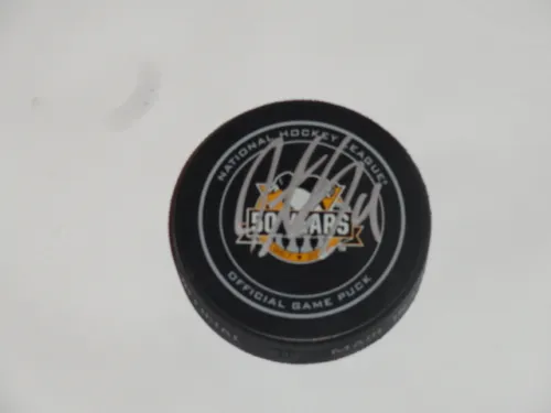 JUSTIN SCHULTZ SIGNED PITTSBURGH PENGUINS 50TH ANNIVERSARY OFFICIAL GAME PUCK