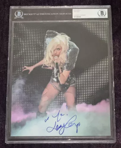 LADY GAGA SIGNED 8 X 10 PHOTO BAS BECKETT AUTH. & ENCAPSULATED COLLECTIBLE MEMORABILIA