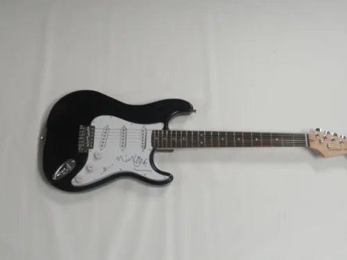 NICK LOWE SIGNED BLACK ELECTRIC GUITAR ELVIS COSTELLO LEGEND AUTOGRAPHED